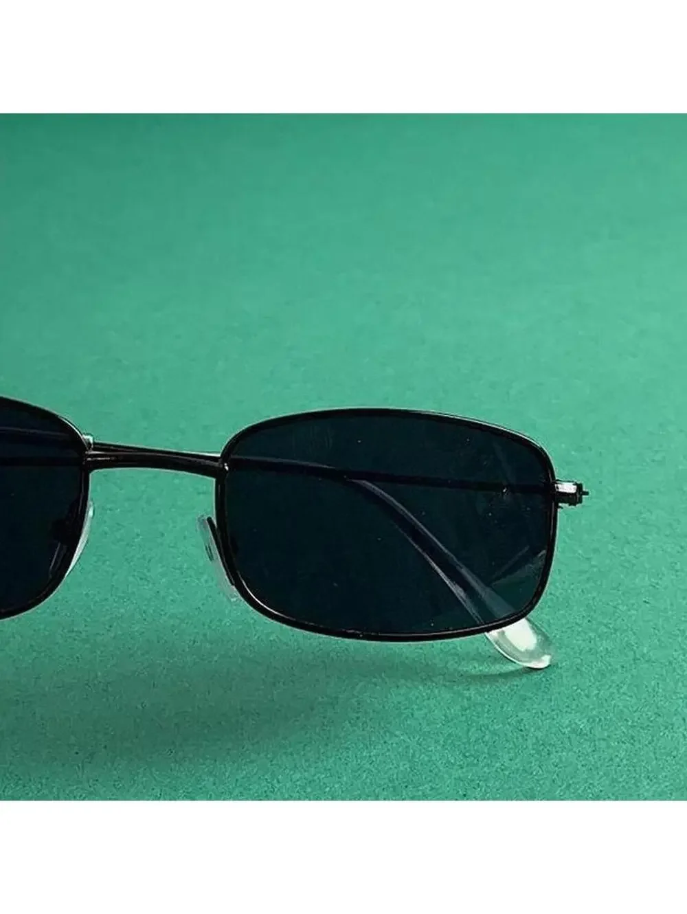 Y2k Cyber 90s 2000s vintage unique slim style black sunglasses. Glasses are